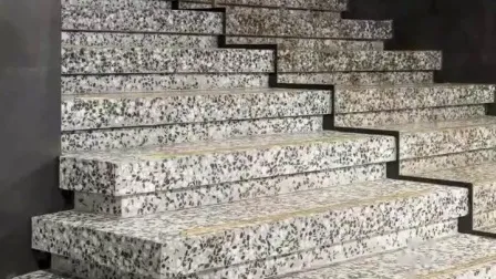 Losa de terrazo negra con virutas de piedra natural blanca